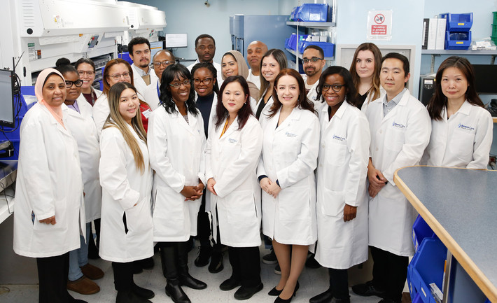 Dr. Kyoung-Sil Kang, PharmD, Director, Pharmacy (front row, fourth from left), Dr. Charnicia Huggins, PharmD, Associate Director, Pharmacy (front row, third from left), and Concourse Pharmacy staff.