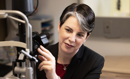 Dr. Ilana B. Friedman, Director, Pediatric Ophthalmology/Associate Residency Program Director, preparing to perform eye examination.