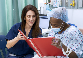 Dr. Deborah Allen, Attending, Orthopaedics (left), with patient.